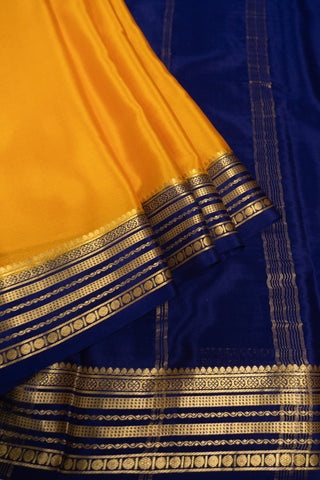 Golden Yellow Mysore Crepe Silk Saree with Dark Blue Pallu & Zari Border