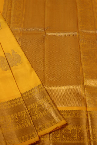 Goldenrod Yellow Kanjivaram Silk Saree with peacock motifs and zari border