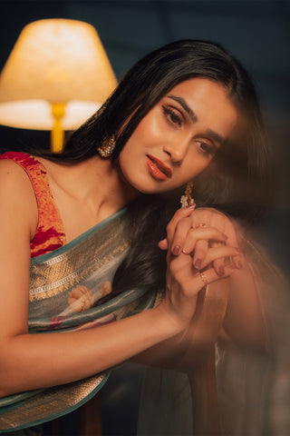 Anushka Kaushik’s Linen Tissue Saree with Lotus motifs