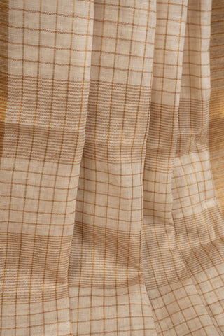 Linen woven gold zari check saree with tassels