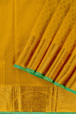 Radiant Yellow Kanjivaram Silk Saree with Green Trim and Self-Weave Motifs