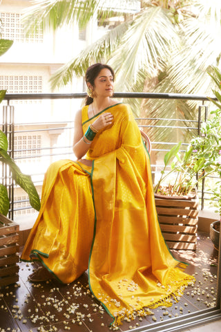 Jyotika's Yellow Kanjivaram Silk Saree with Self Weave Motifs and Green Trim Elegant Bridal Saree (Made to Order)