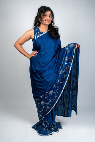 Ocean blue satin saree with silver embroidery and sea motifs
