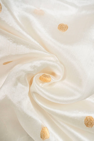Off-white pure silk Chanderi saree with gold zari rudraksh motifs and striped tissue pallu