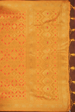 Marigold yellow Banarasi dupatta with gold zari diamond jaal, red and orange meenakari florals and woven pallu with tassels