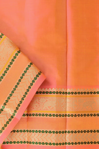White Kanjeevaram silk saree with pink checks and orange temple border