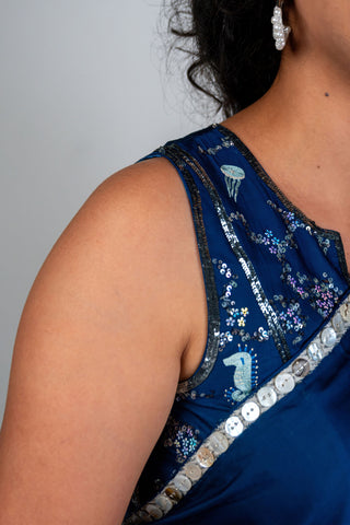 Ocean blue satin saree with silver embroidery and sea motifs