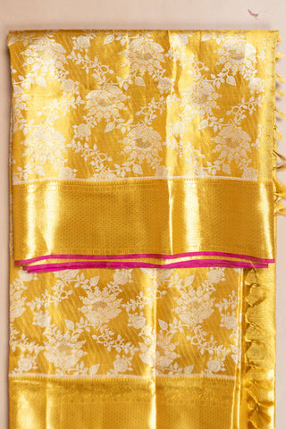 Gold Kanjivaram silk saree with floral jaal and pink contrast border
