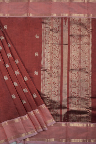 Rich maroon pure silk saree with gold zari Yali motifs and contrasting peach pink fish motif border