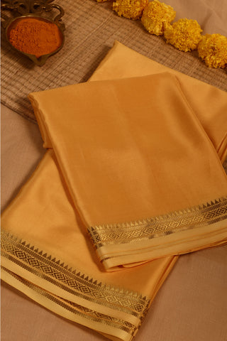 Goldenrod Yellow Mysore Crepe Silk Saree with geometric zari border