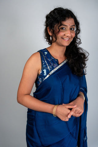 Ocean blue satin saree with silver embroidery and sea motifs