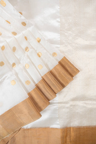 Off-white pure silk Chanderi saree with gold zari rudraksh motifs and striped tissue pallu