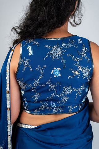 Ocean blue satin saree with silver embroidery and sea motifs