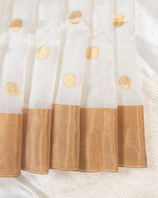 Off-white pure silk Chanderi saree with gold zari rudraksh motifs and striped tissue pallu