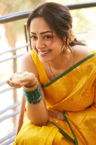 Jyotika's Yellow Kanjivaram Silk Saree with Self Weave Motifs and Green Trim Elegant Bridal Saree (Made to Order)