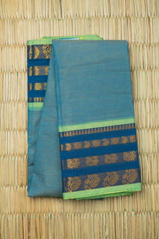 Blue-green dhoop-chaon Chettinad cotton saree with lime green, navy and gold zari motifs