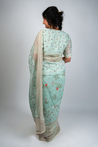 Aqua green Chanderi saree with floral and striped border