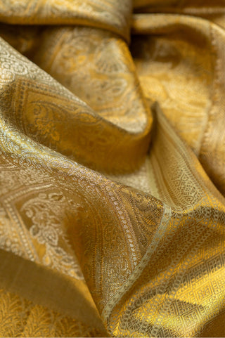 Gold Kanjivaram Tissue Silk Saree with traditional peacock motifs