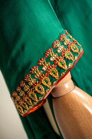 Emerald Green Tanjore Modal Silk Suit with Guttapusalu Embroidery and Brocade Borders