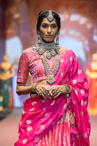 Fuchsia Banarasi silk lehenga with zardosi embroidery and pearl work