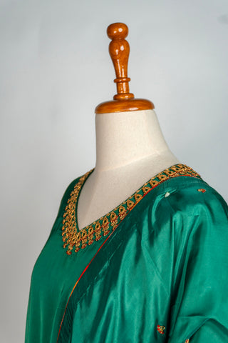 Emerald Green Tanjore Modal Silk Suit with Guttapusalu Embroidery and Brocade Borders