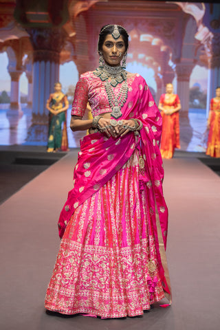 Fuchsia Banarasi silk lehenga with zardosi embroidery and pearl work