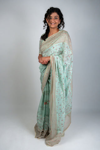 Aqua green Chanderi saree with floral and striped border