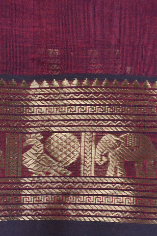 Deep aubergine pure silk saree with gold zari peacock motifs and elephant peacock striped pallu panels