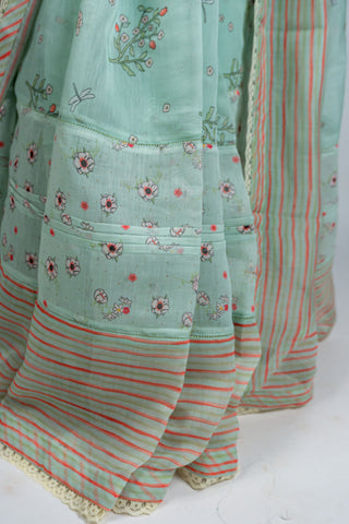 Aqua green Chanderi saree with floral and striped border