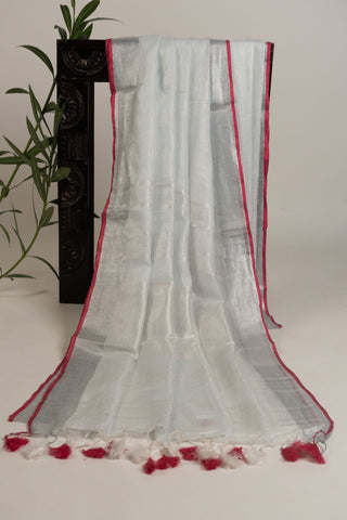 White linen saree with magenta border and tassels