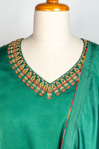 Emerald Green Tanjore Modal Silk Suit with Guttapusalu Embroidery and Brocade Borders