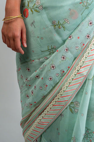Aqua green Chanderi saree with floral and striped border