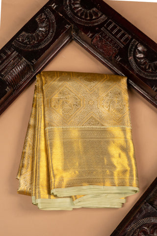 Gold Kanjivaram Tissue Silk Saree with traditional peacock motifs