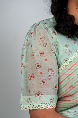 Aqua green Chanderi saree with floral and striped border