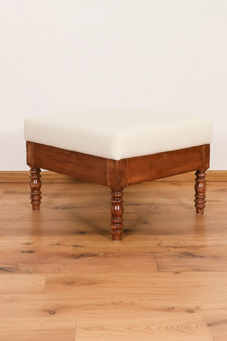 Beige velvet ottoman with turned teakwood legs and vintage design