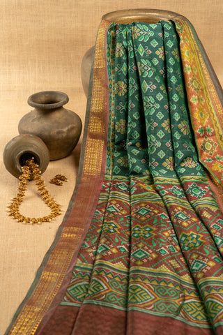 Forest Green Art Silk Patola Print Saree with floral buttas and geometric panels