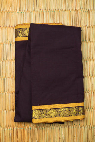 Plum Chettinad cotton saree with mustard gold zari border and paisley floral motifs