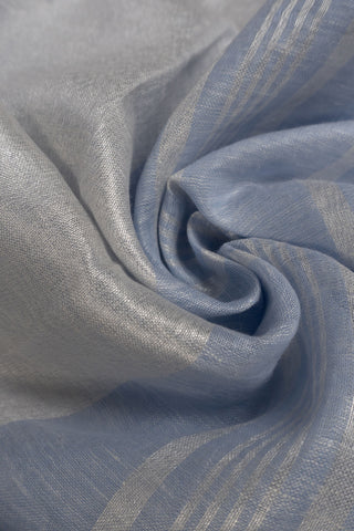 Pastel blue linen saree with zari border