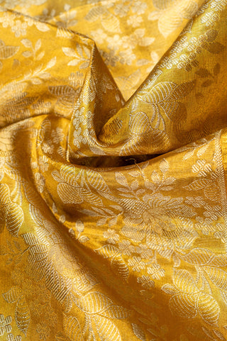 Golden Tissue Kanjivaram Saree with heavy pure zari border and brocade