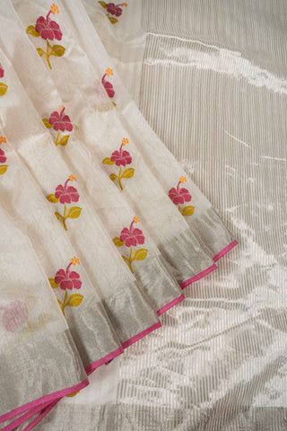Off-white silk cotton Chanderi saree with pink hibiscus motifs and silver zari striped pallu