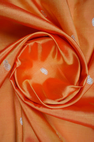 Orange Paithani silk saree with light gold buttis and a tissue pallu of circular chakra motifs with peacocks