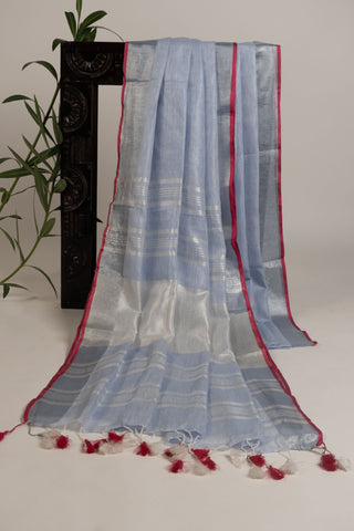 Pastel blue linen saree with zari border