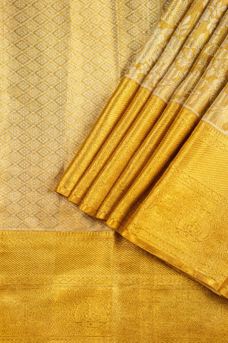Golden Tissue Kanjivaram Saree with heavy pure zari border and brocade