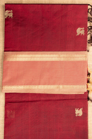maroon handwoven silk cotton saree with lion buttas and temple border handcrafted saree from Madhurya