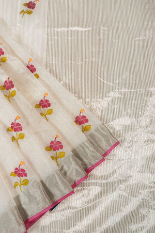 Off-white silk cotton Chanderi saree with pink hibiscus motifs and silver zari striped pallu