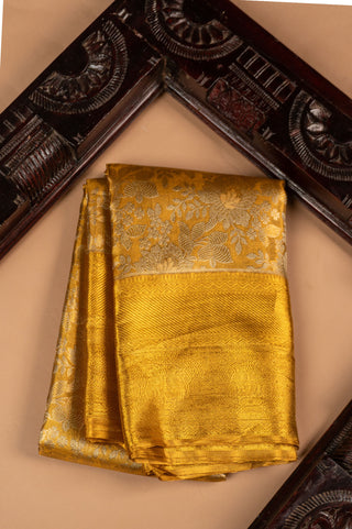 Golden Tissue Kanjivaram Saree with heavy pure zari border and brocade