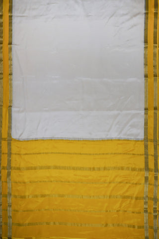 Draped off-white silk saree with a plain body, mustard yellow twin zari stripe border and yellow striped pallu