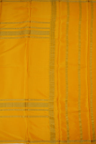 Mustard yellow crepe silk saree with zari border