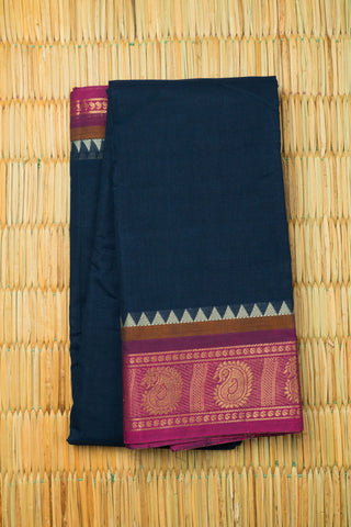 Navy blue Chettinad cotton saree with magenta and gold zari border and woven striped pallu