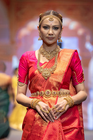 Crimson red Kanjivaram silk saree with Vanamasingaram zari border